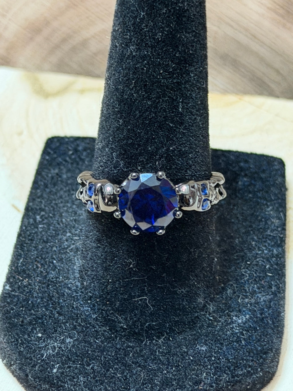 Black Gold Plated Double Skull Ring with Blue CZ Solitaire