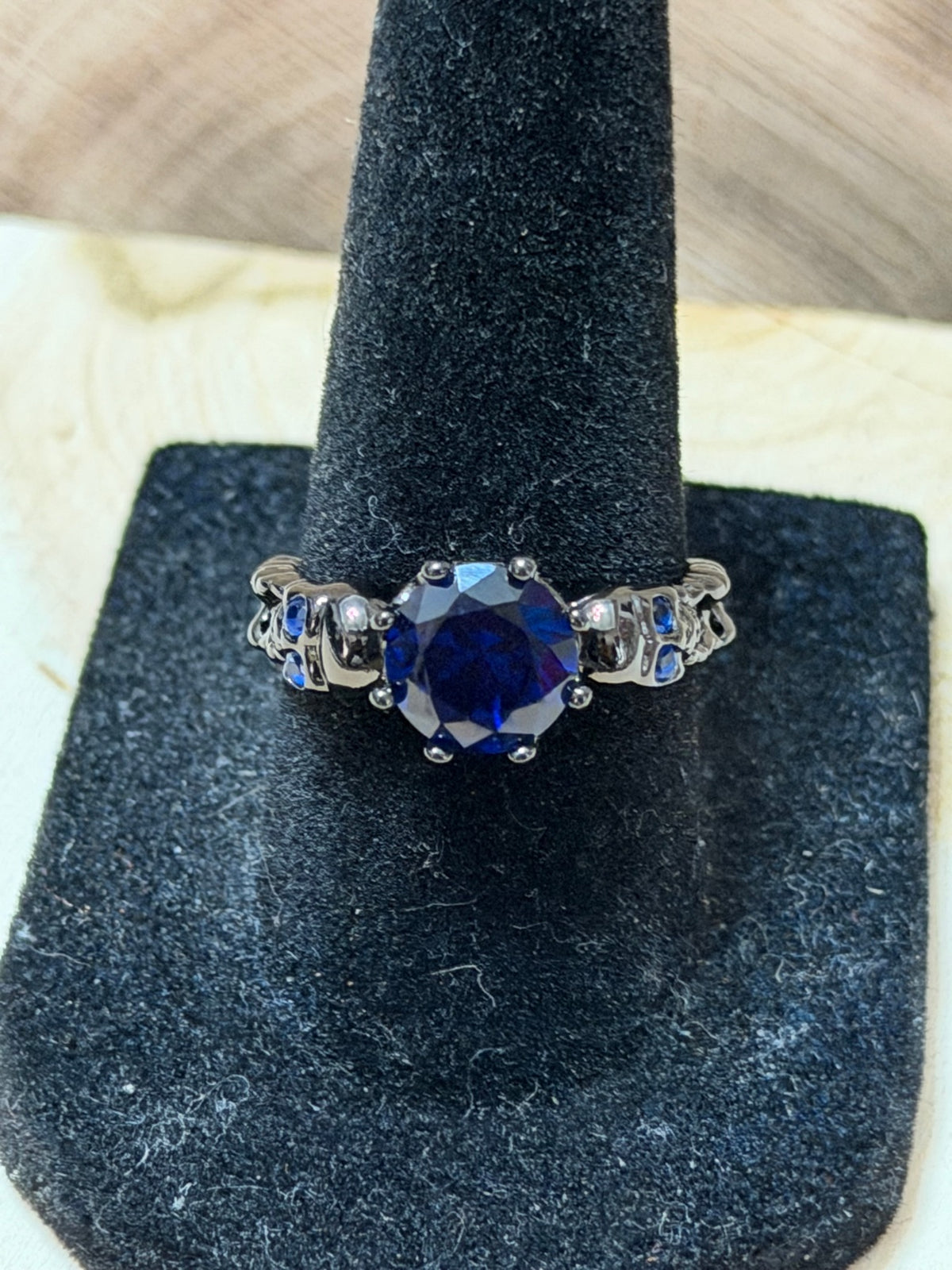 Black Gold Plated Double Skull Ring with Blue CZ Solitaire