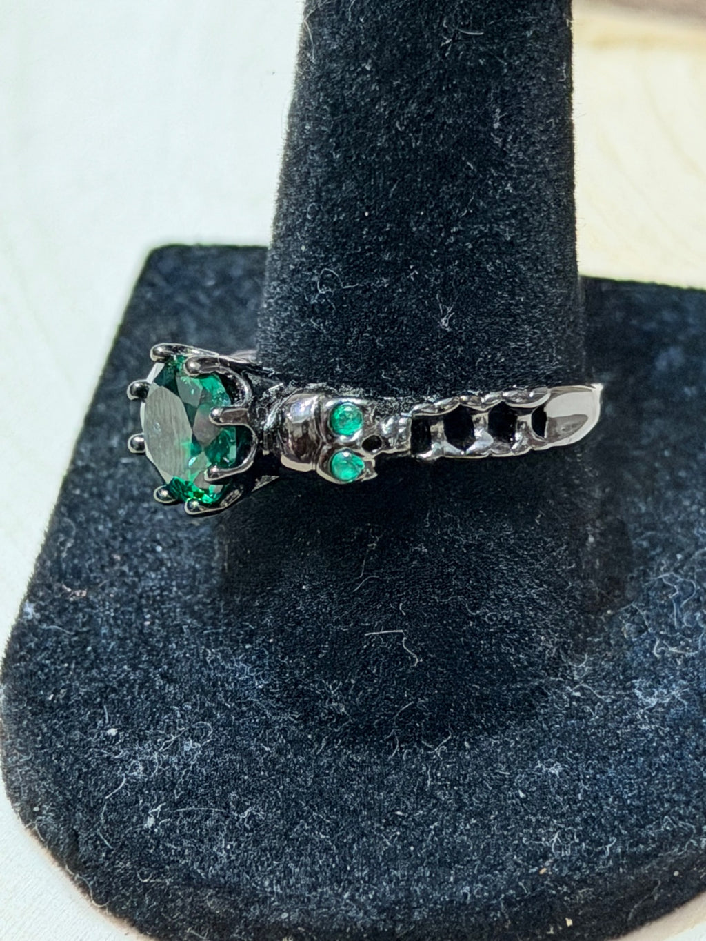 Black Gold Plated Double Skull Ring with Green CZ Solitaire