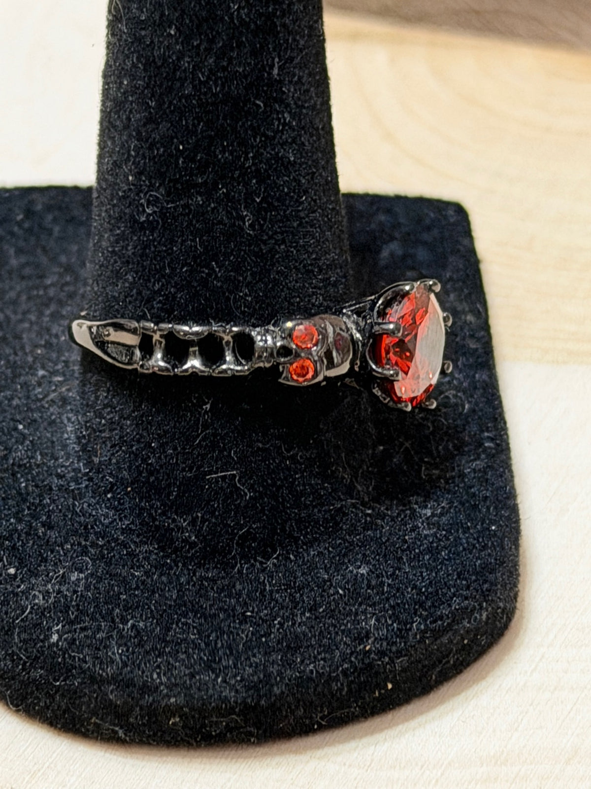 Black Gold Plated Double Skull Ring with Red CZ Solitaire