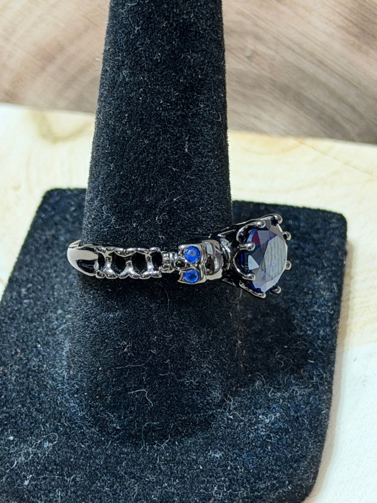 Black Gold Plated Double Skull Ring with Blue CZ Solitaire