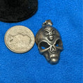 Double Skull Metal Pendant