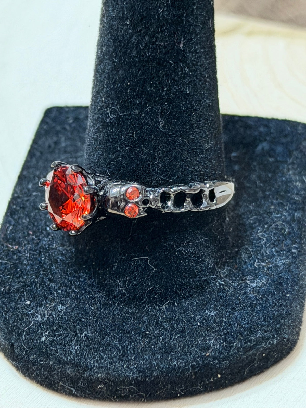 Black Gold Plated Double Skull Ring with Red CZ Solitaire